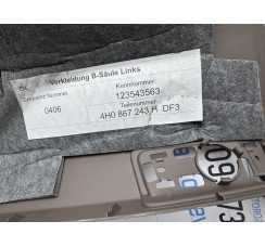 Обшивка стойки центральной левая коричневая  Audi A8 D4  